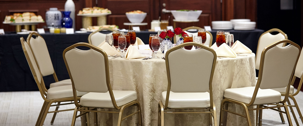 A dinner table prepared for a dinner event