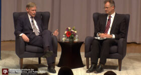 Ambassador Robert B. Zoellick talks with Dr. Raymond Robertson