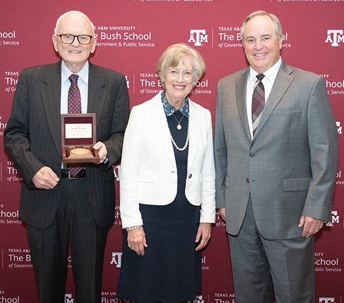 Jim and Meredith Olson with Bush School Dean Mark Welsh