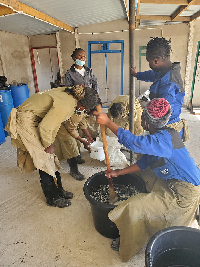 Photo of Zimbabwe community making soap
 
