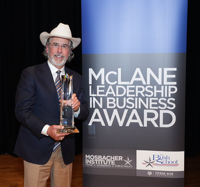 Mr. Alpin receiving the 2022 McLane Leadership in Business Award.