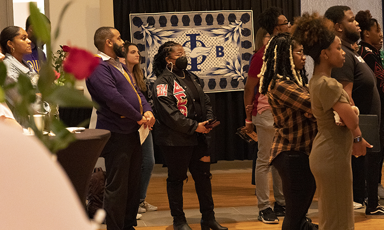 Attendees listen to a speaker at the Salute to the Divine Legacy of Black Sororities and Fraternities event on Feb. 15.