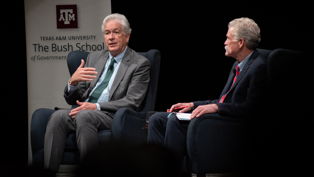 CIA Director Bill Burns visits with the Bush School's Greg Vogle on stage at the event