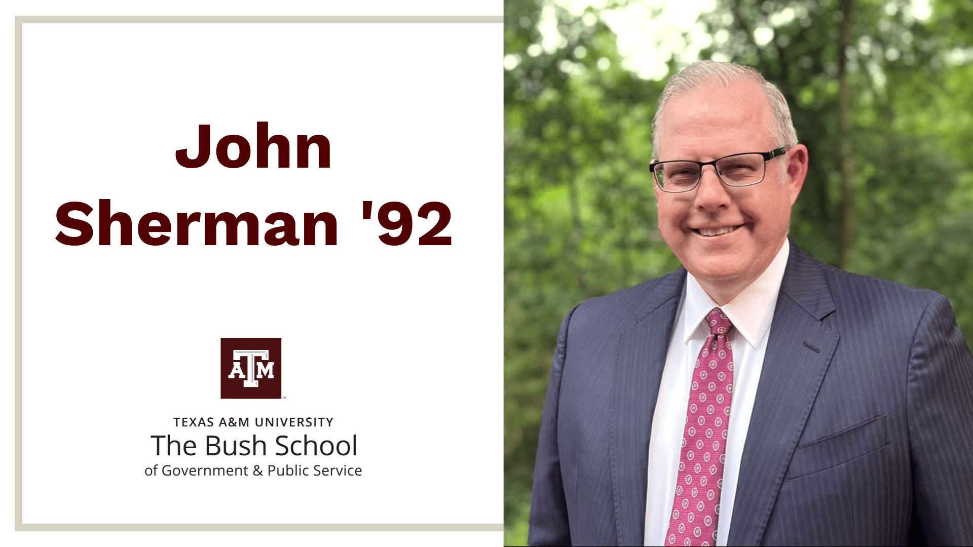 A head-and-shoulders photo of John Sherman, dean of The Bush School of Government and Public Service. Sherman is smiling, wearing a suit with an Aggie-red tie.